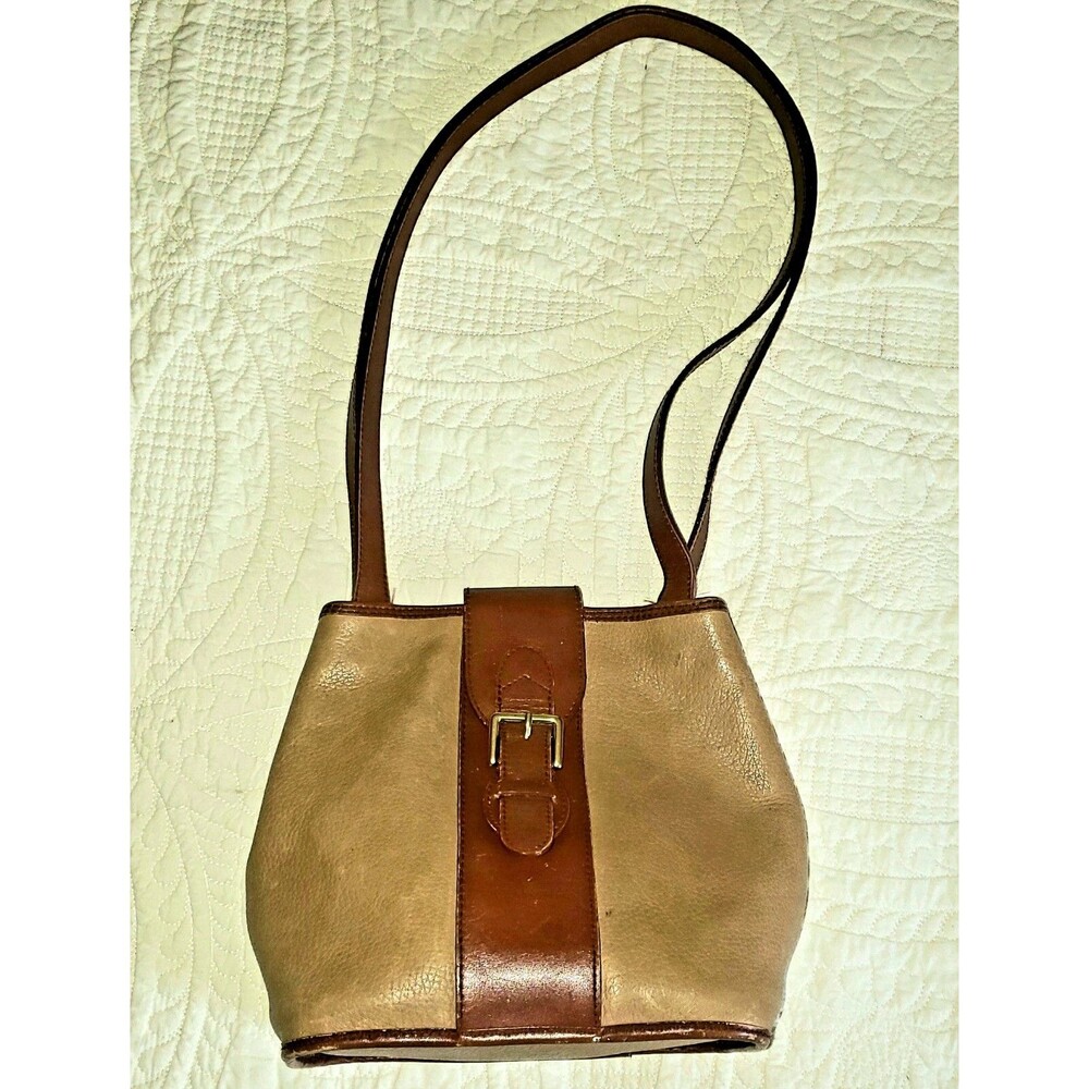 Hexagonal tan and oxblood vertical trim leather shoulder bag by Lisa Loren